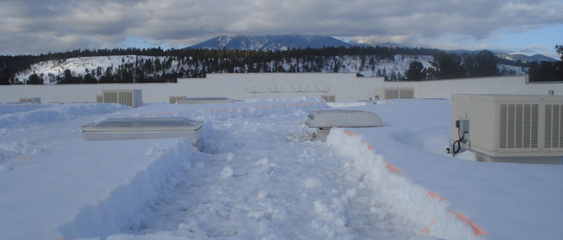 Flat roof snow removal
